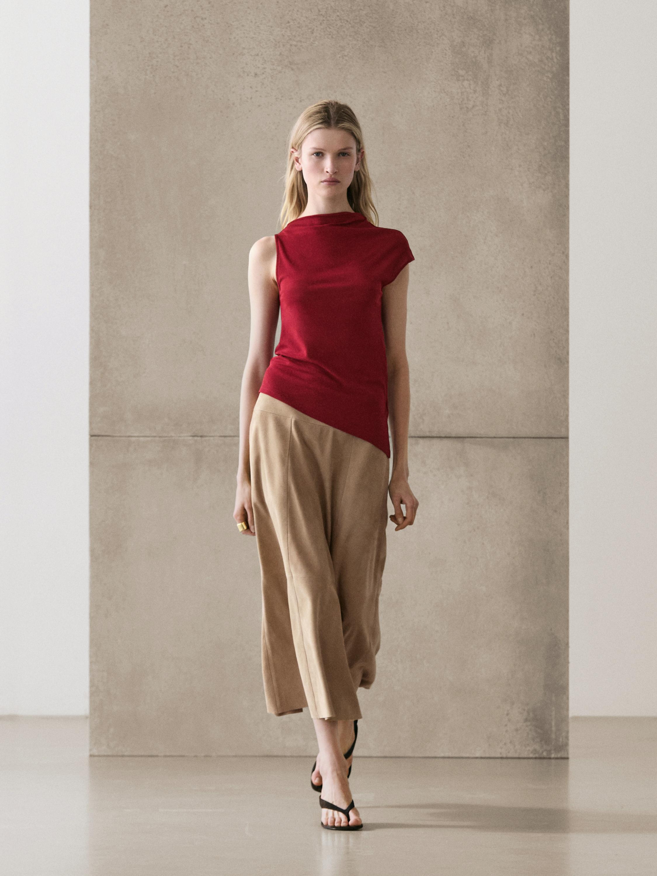 100% cotton top with asymmetric detail
